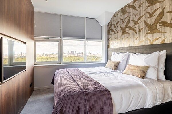 Slaapkamer - comfortabel appartement met panoramisch uitzicht in Den Haag (5)