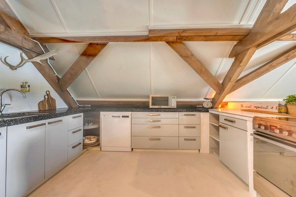 Keuken - Gezellig verblijf met recreatieruimte in Doorn (5)