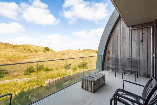 Terras - Luxe appartement met privésauna in Sint Maartenszee (3)