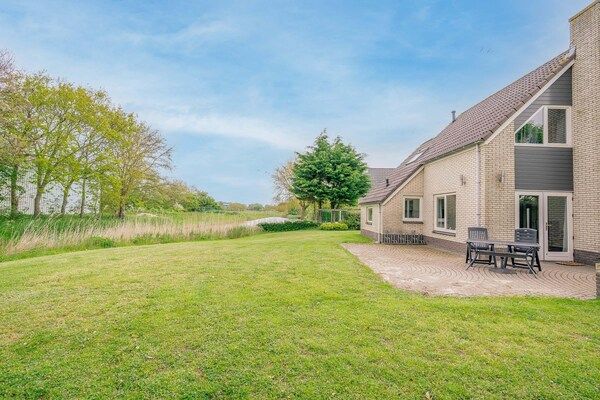 Tuin - Sfeervolle villa nabij zee en bos in De Koog (2)