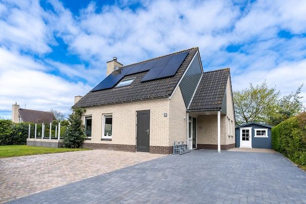 Buitenkant - Sfeervolle villa met houtkachel nabij zee en bos in De Koog (2)
