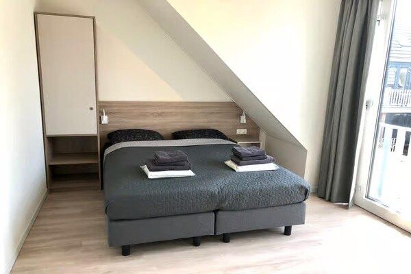 Slaapkamer - Lodge in Zoutelande vlakbij strand in Zoutelande (5)