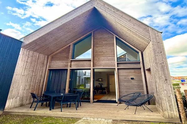 Terras - Gezellige 4-persoons lodge in tiny house stijl. in Zoutelande (5)