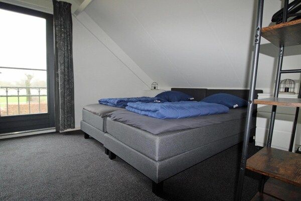 Slaapkamer - Moderne bungalow in Ewijk voor 6 personen in Ewijk (4)