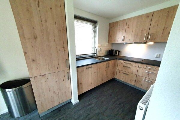 Keuken - Lichte en moderne bungalow in Ejwik in Ewijk (3)