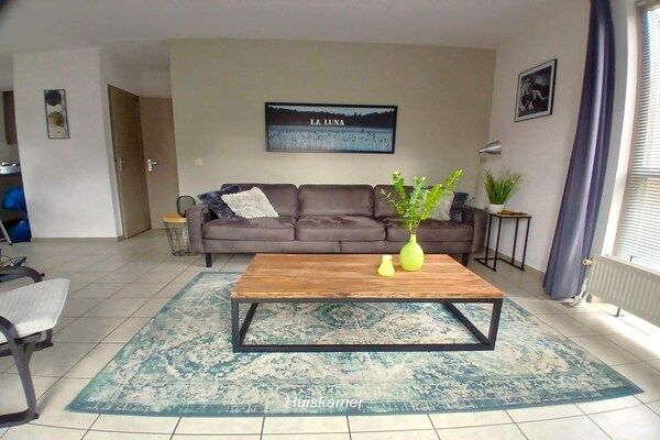 Woonkamer - Villa voor 6 personen met omheinde tuin in Ewijk (1)