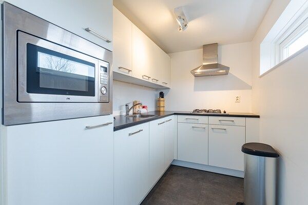 Keuken - Moderne gezinswoning vlakbij het strand in Renesse (3)