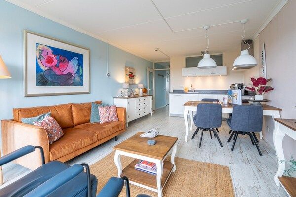 Woonkamer - 4 Persoons appartement met zeezicht in De Koog (5)