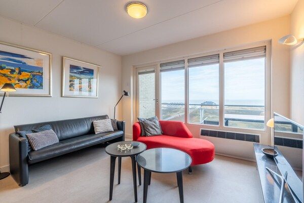 Woonkamer - 4 Persoons appartement met zeezicht in De Koog (5)