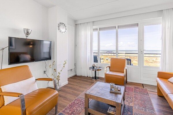 Woonkamer - 4 Persoons appartement met zeezicht in De Koog (3)