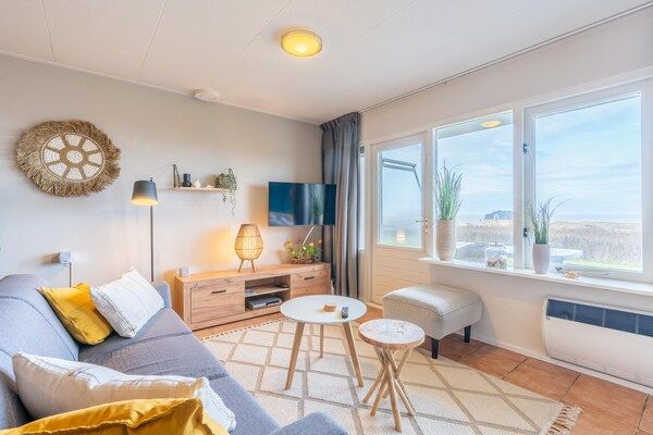 Woonkamer - 2 persoons zeezicht appartement in De Koog (5)