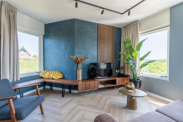 Woonkamer - 4 Persoons appartement met eilandzicht in De Koog (4)