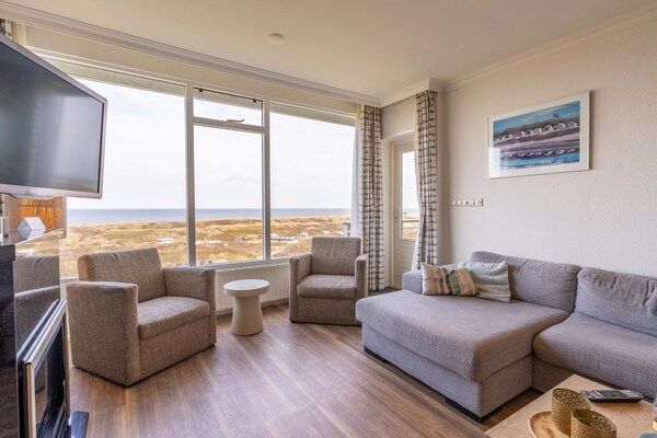 Woonkamer - 4 Persoons appartement met zeezicht in De Koog (5)