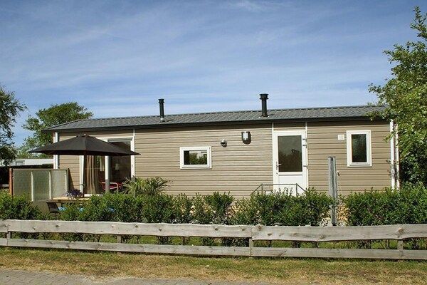 Buitenkant - Chalet vlakbij het strand in Hollum in Hollum (4)
