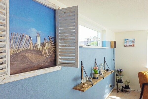 Woonkamer - Ongerepte strandbasis in Noordwijk in Noordwijk (4)