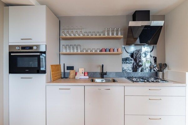 Keuken - Rustgevende ontsnapping aan het water met sauna in Stavenisse (4)