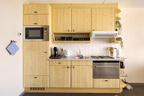 Keuken - Prachtig modern ingericht vakantie appartement met in Callantsoog (4)