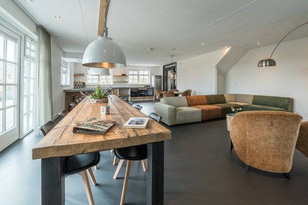 Eetkamer - Luxe villa met sauna voor 12 personen in Den Burg (3)
