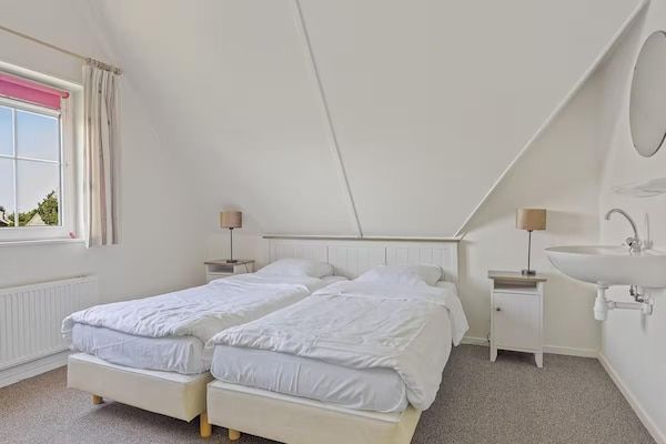 Slaapkamer - Luxe strandvilla voor 4 personen in Makkum in Makkum (5)