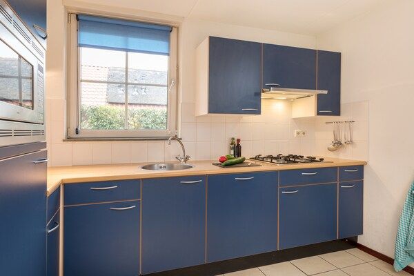 Keuken - Moderne bungalows vlakbij het strand in De Koog (3)