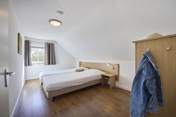 Slaapkamer - Boerderij in Limburg met privé sauna in Roggel (4)