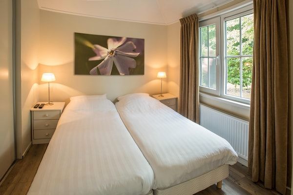 Slaapkamer - Ontspannend chaletverblijf in Hoge Hexel (4)