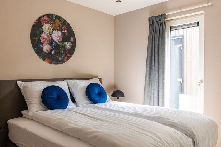 Een slaapkamer van Vakantiepark Latour 4 in Oirschot