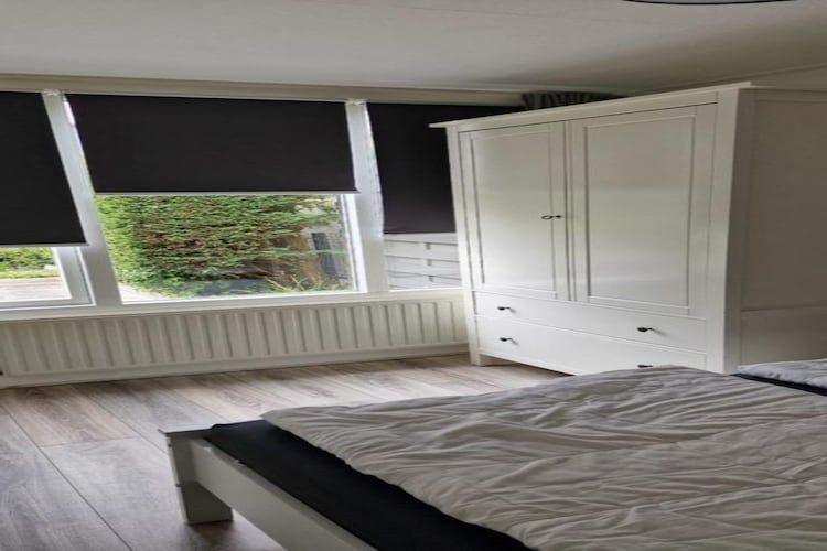Een slaapkamer van Schoneveld 157 Duinroos Breskens in Breskens